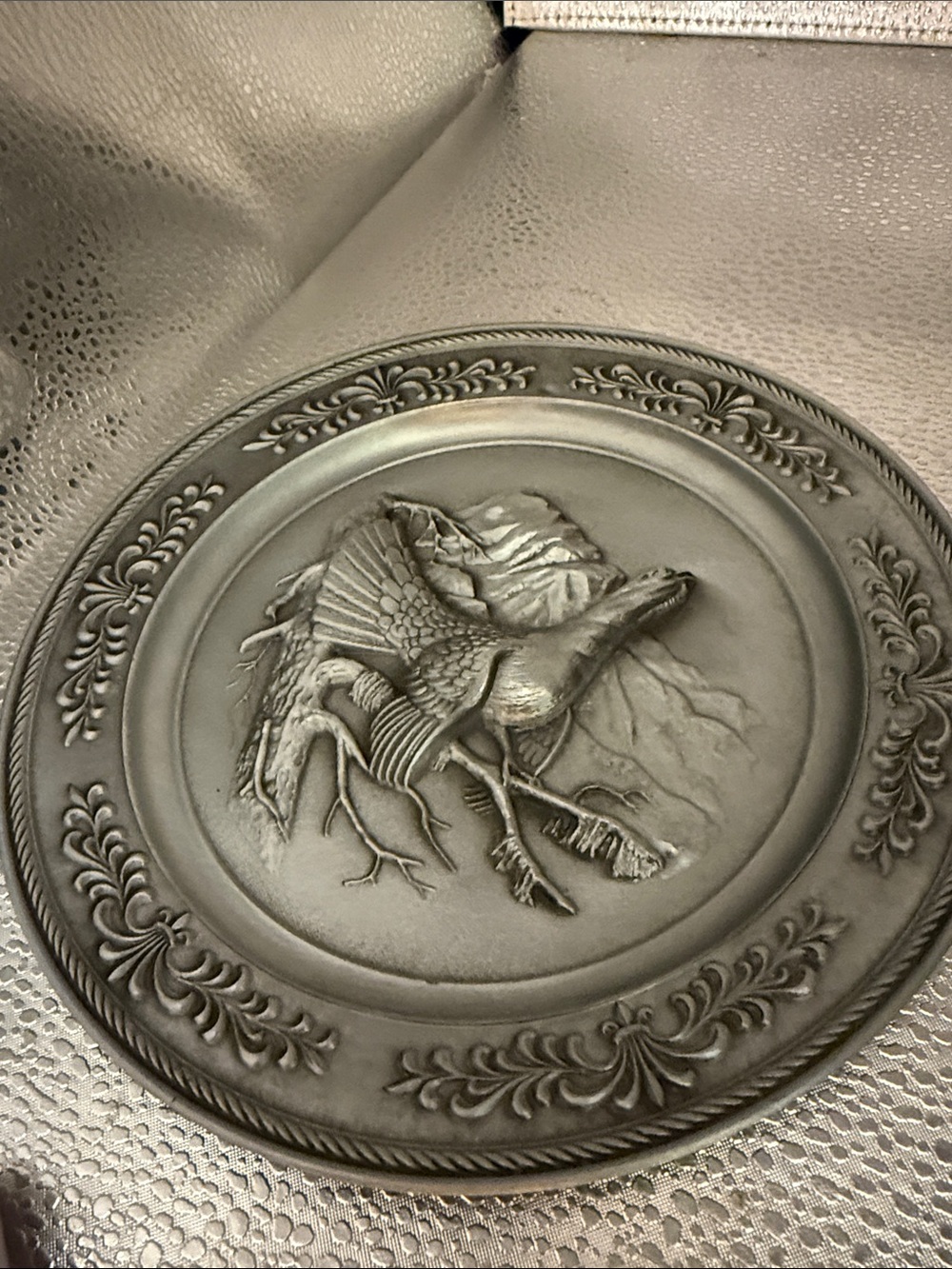 Vintage embossed pewter pheasant wall plate